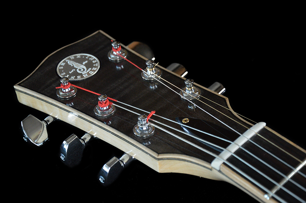 Shank-Instruments-chitarra-archtop-liuteria-milano-acero-marezzato-massello-paletta-jazz