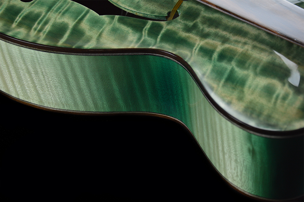 chitarra-archtop-jazz-corde-nylon-shank-instruments-emanuele-d'alò-liuteria-milano-massello-acero-fiammato