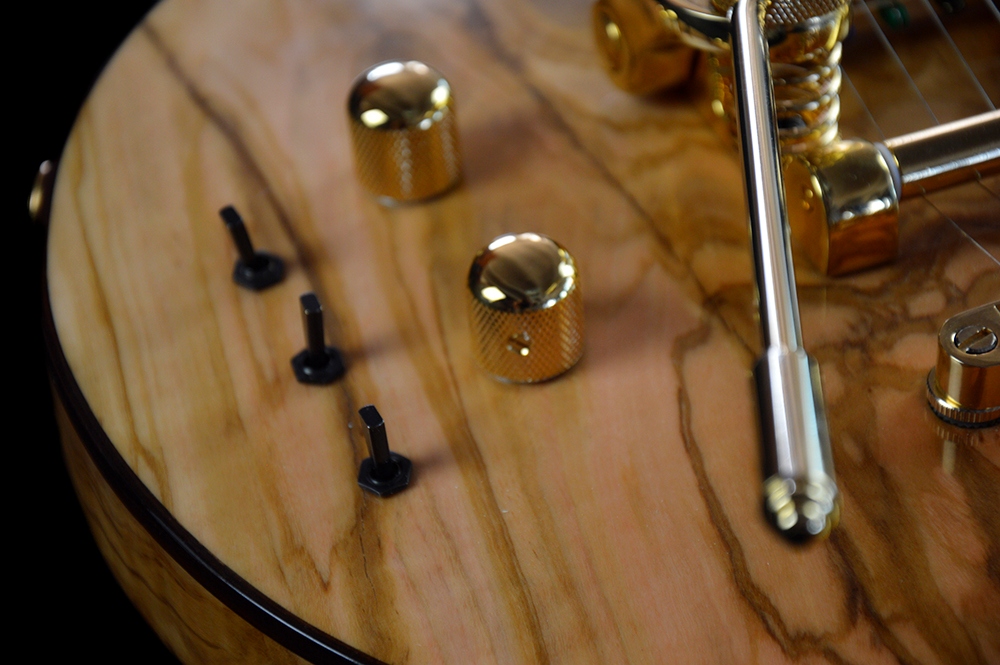 shank-instruments-liuteria-milano-chitarra-legno-ulivo-emanuele-d'alò-ground-custom-riparazioni