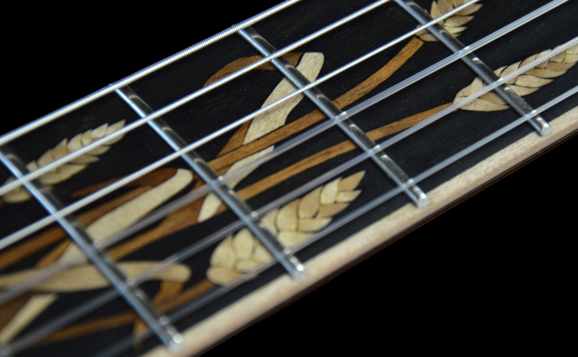 shank-instruments-chitarra-archtop-corde-nylon-intarsio