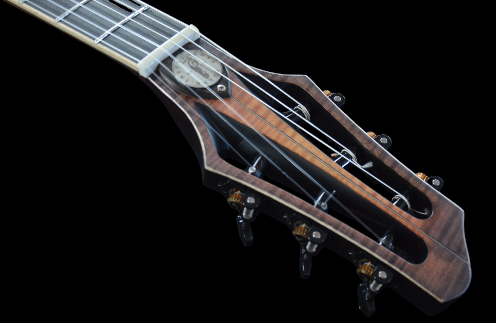 shank-instruments-chitarra-archtop-corde-nylon-liuteria-milano-vendita-paletta-design