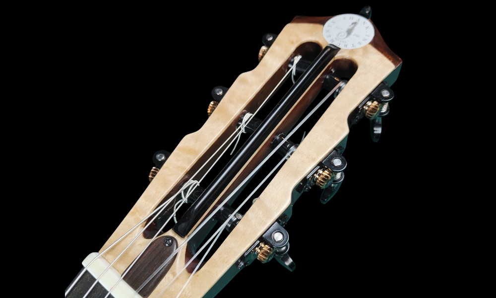 shank-instruments-milano-chitarra-liuteria-archtop-acustica-corde-nylon-vendita-emanuele-D'Alò-paletta-custom-slotted