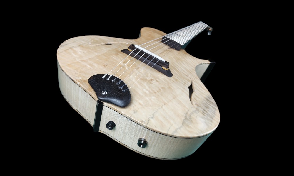 shank-instruments-milano-chitarra-liuteria-archtop-acustica-vendita-acero-fiammato-corde-nylon